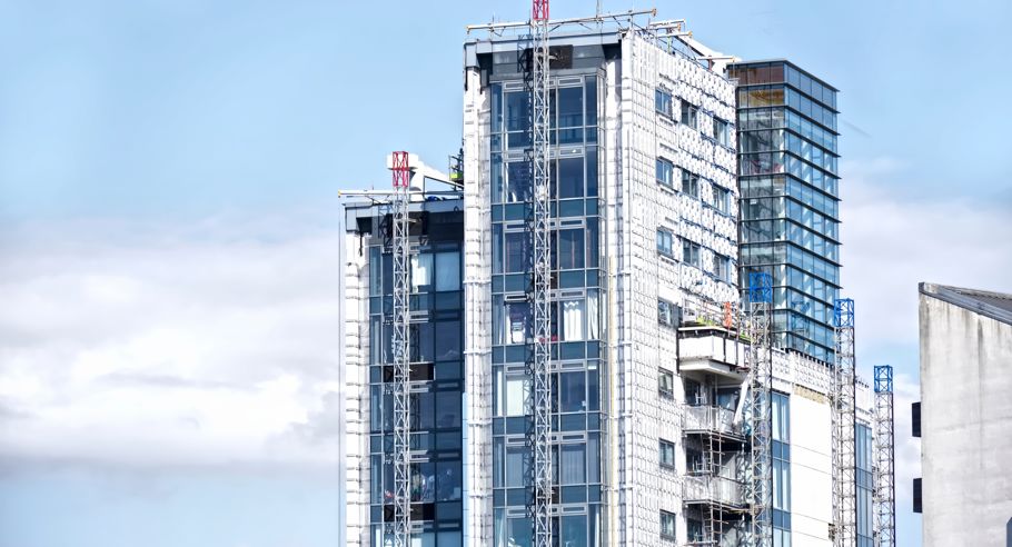 An architectual image of a modern apartment block