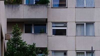 An Architectual image of the side of an apartment