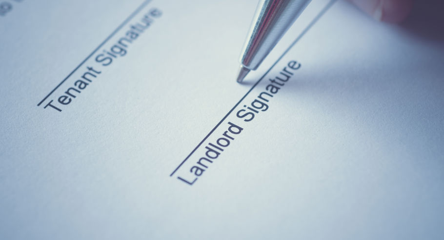 A person signing under 'Landlord Signature'